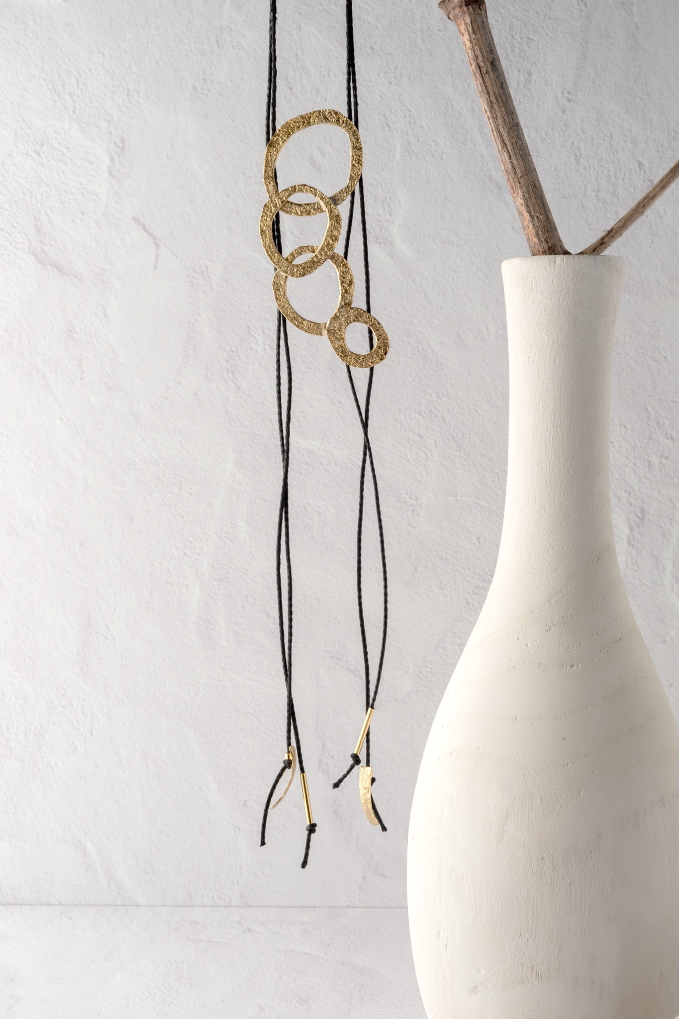 Kalliope Bronze Circle and Black Cord Necklace 