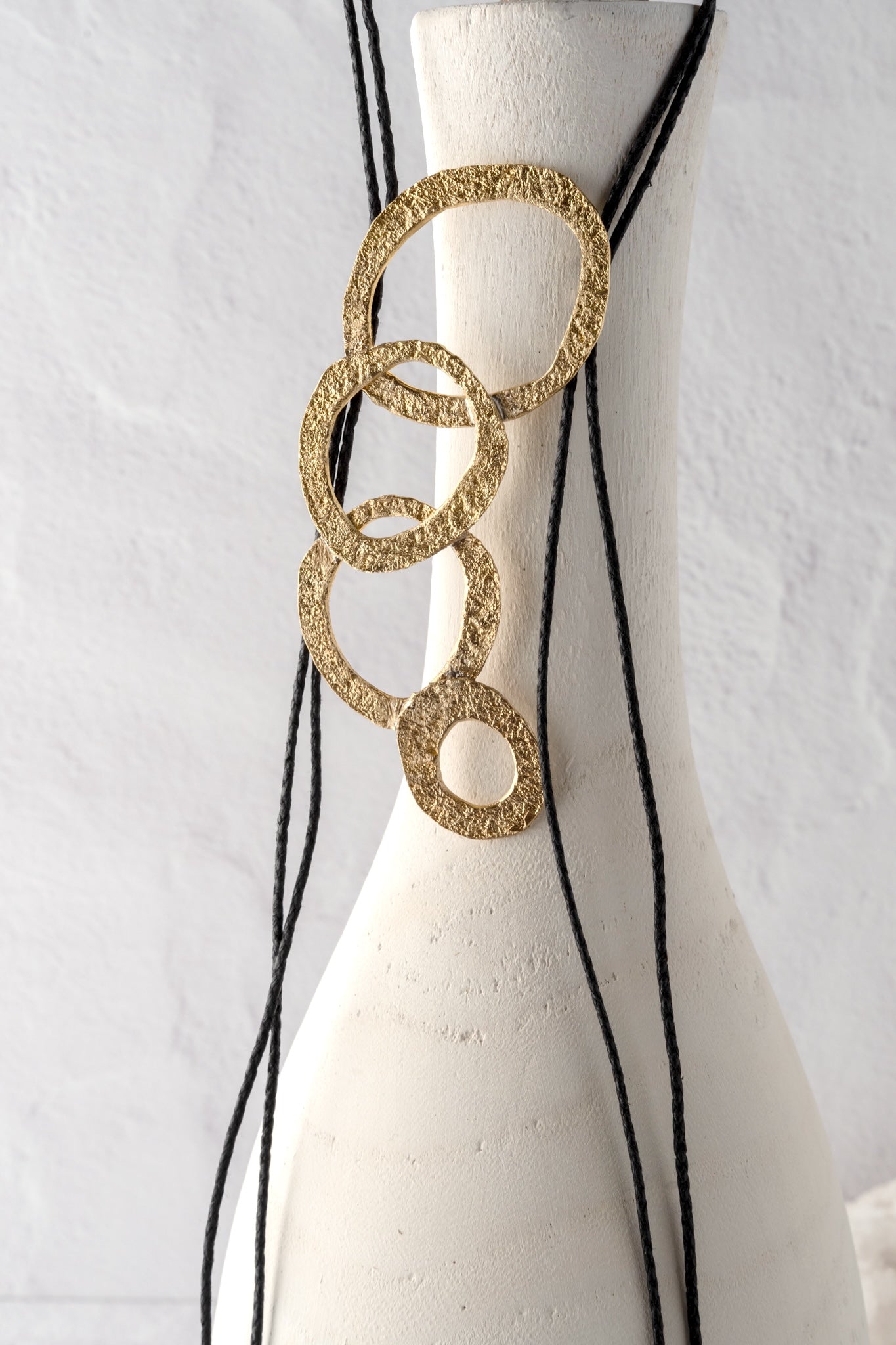 Kalliope Bronze Circle and Black Cord Necklace 