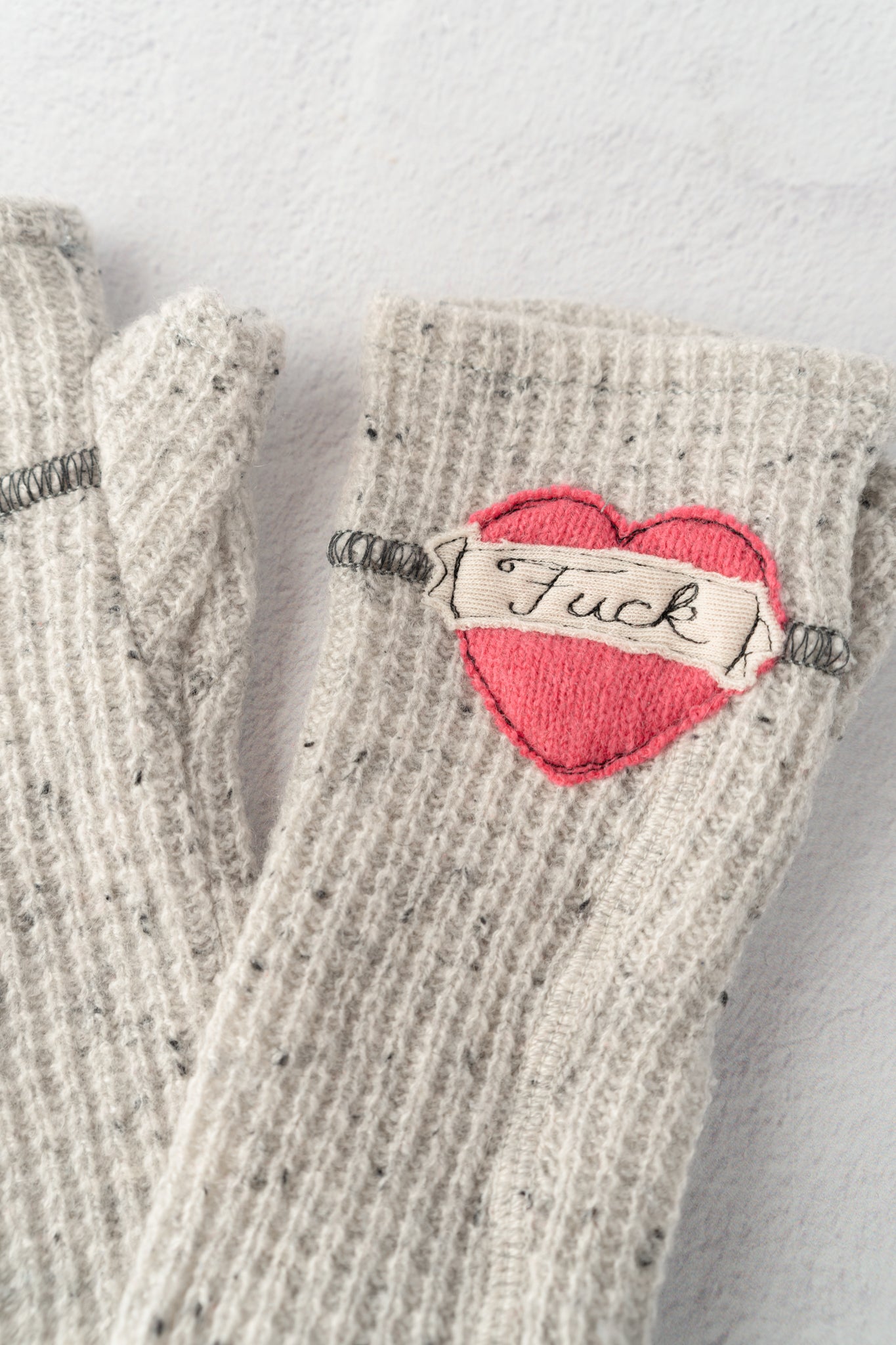 Sardine Recycled Cashmere Handwarmers, Tattoo Heart F*ck, Gray/Pink 